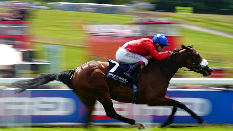 FORMAL START TO THE BETFRED DERBY FESTIVAL AS SHE LANDS SURREY STAKES 