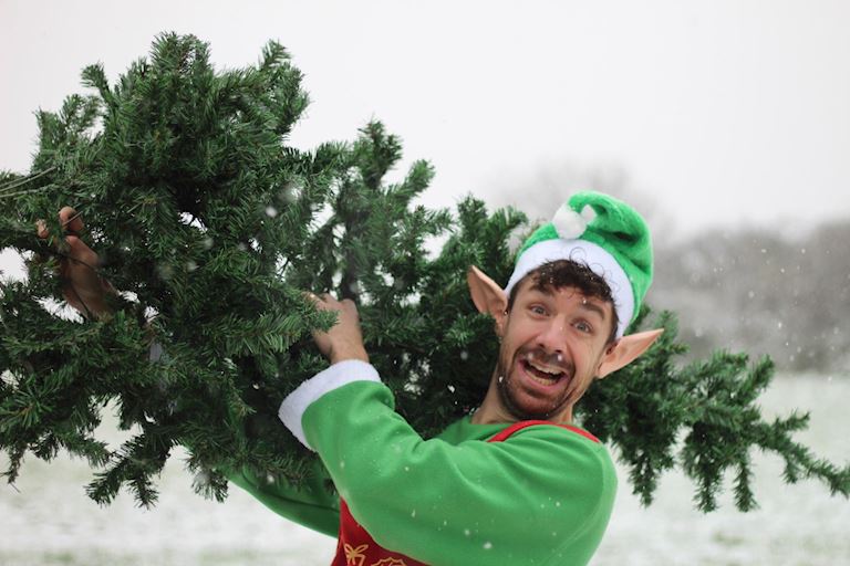 phil carrying tree.jpg